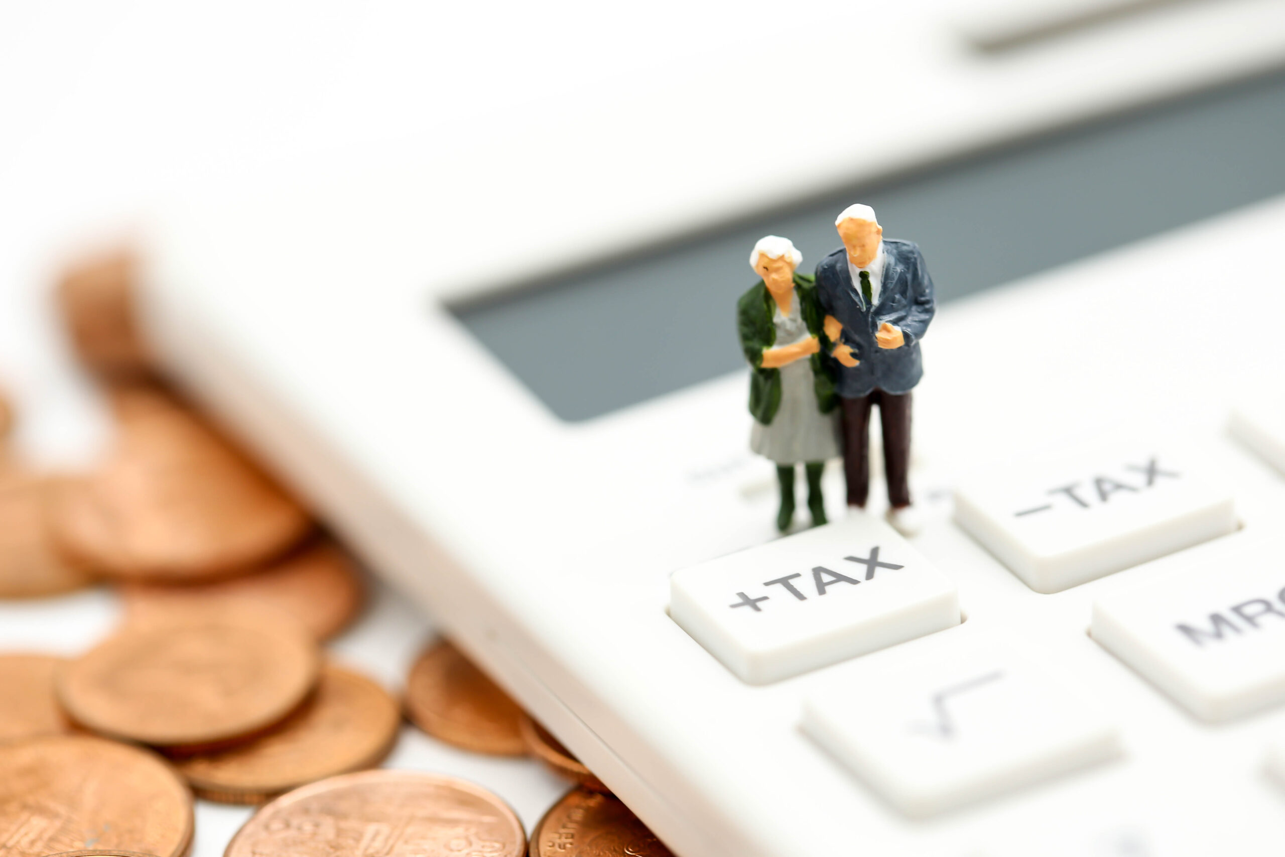 Elderly couple reviewing inheritance tax planning with an adviser in Northampton