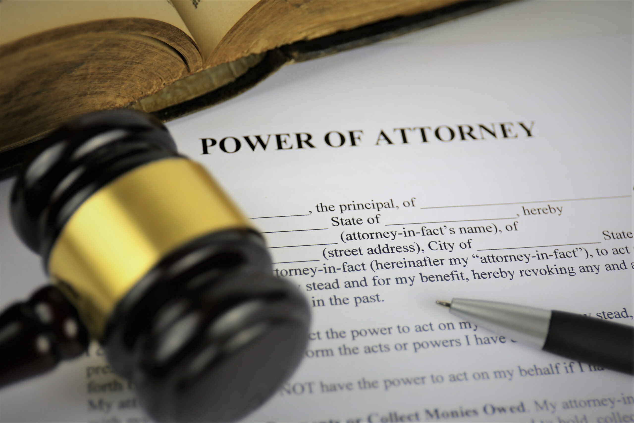 Signing a Lasting Power of Attorney document with Choice Wills, Northampton